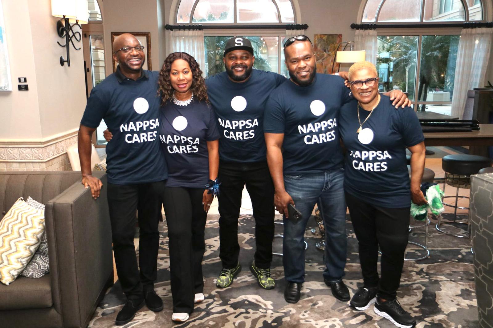 NAPPSA members wearing NAPPSA Cares shirts at a community event