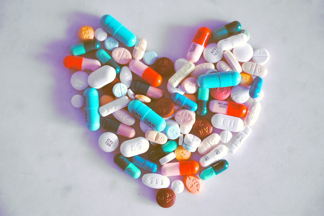 Colorful pills arranged in a playful heart shape for Rx Match-Up